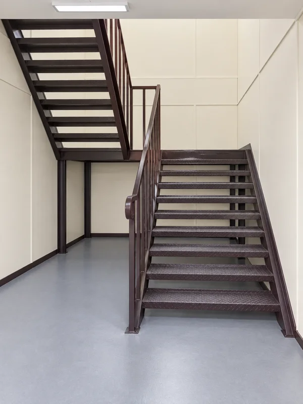 Internal stairs in a G+1 cabin building