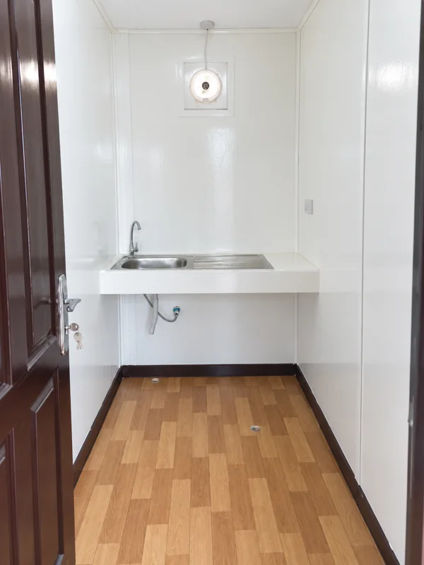 Pantry inside a standard 12 × 3.6 m cabin